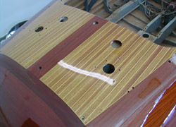 Applying the finish on a Riva Tritone Aperto